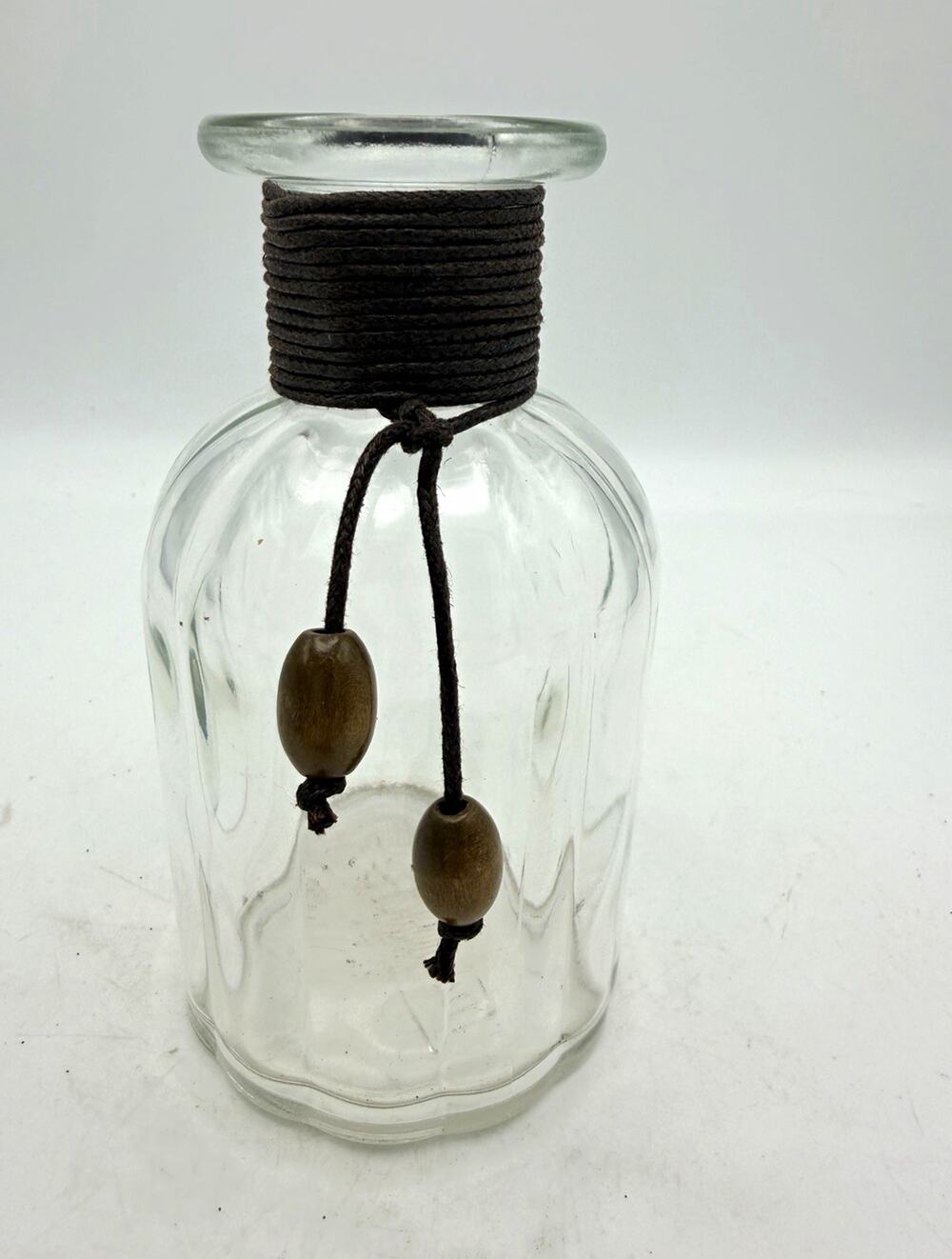 Pier 1 imports Bottle with Wrapped Neck, Cord and Bead Accents